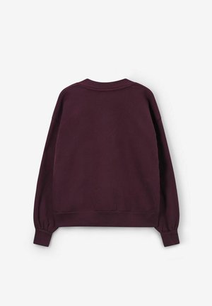 Bordeaux sweatshirt met lange mouwen, ronde hals, verlaagde schouders en ribgebreide manchetten. Zachte stof met een gladde textuur.