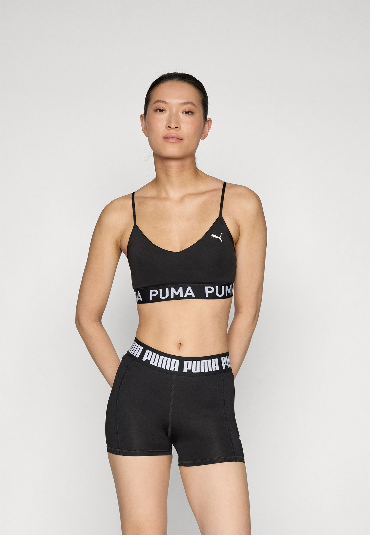 PUMA MOVE STRONG BRA - Light support sports bra - black