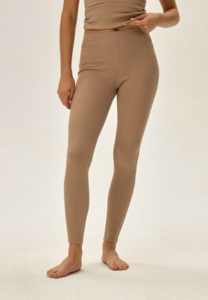 - Legginsy typu pończochy