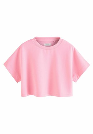 Vaaleanpunainen lyhythihainen crop-top t-paita, jossa on pyöreä kaula-aukko, esillä valkoista taustaa vasten.