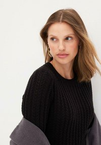 bonprix Abito in maglia - black
