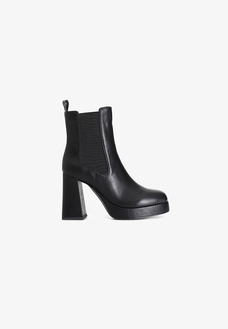 Black leather ankle boot with elastic side panels, rounded toe, and chunky block heel. Features a smooth texture and a pull tab at the back.
