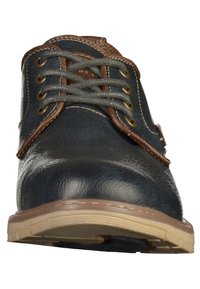 Mørkeblå lædersko med brune accenter, rund tå, grå snørebånd og beige gummisål. Glat tekstur med kontrasterende syninger.