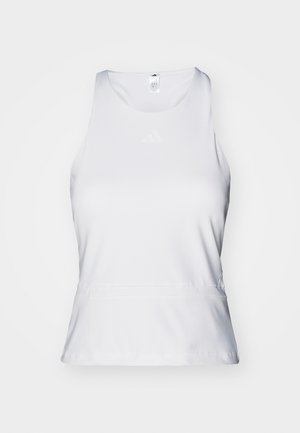 Witte mouwloze sporttop met een ronde hals, een gladde textuur en een subtiele tonal logo op de borst. Rechte zoom aan de taille.