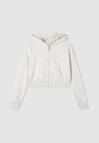 Felpa corta grigia chiara, realizzata in tessuto morbido, presenta una chiusura con zip frontale, polsini a costine e due tasche anteriori. Cappuccio incluso.