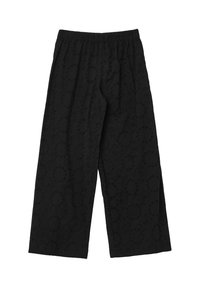 Schwarze Hose mit weitem Bein und elastischem Bund, mit einem strukturierten Muster aus Kreisen und floralen Motiven auf dem gesamten Stoff.