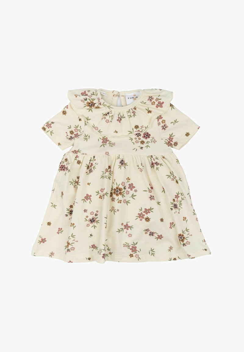 Kreemikas tooni lillelise mustriga kleit, lühikeste varrukatega, kokku kogutud rinnaosa ja volangiga kaelusesse. Asetatud on väikesed roosa ja rohelise lillemustritega.