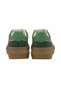 Green suede sneakers with a purple accent stripe, rubber sole, and padded collar. Back view showcases rounded design and layered textures.
