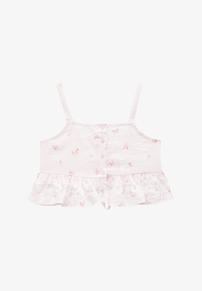 Lyserød bomuldsbluse med spaghetti-stropper, der har frontknapper, blomstermønster og en volangkant med blondekant.