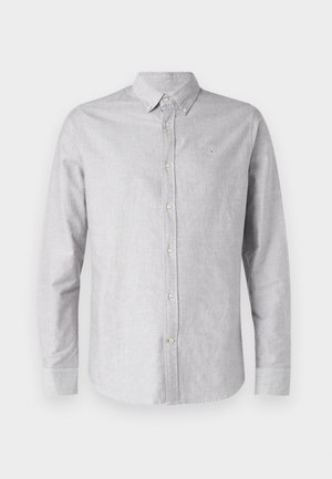 Light gray button-up shirt in a soft fabric, featuring a collar, long sleeves, and a small embroidered logo on the chest.
