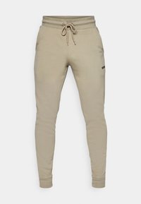 ESSENTIAL SWEATPANTS - Tepláky - vetiver
