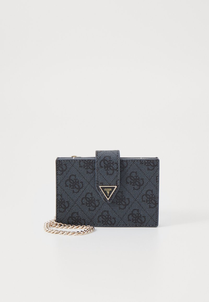Cardholder with chain strap, dark blue textured fabric, embossed logo pattern, triangular gold hardware, and magnetic closure.