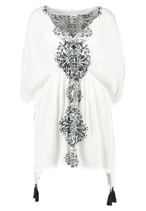 Balts tunikas krekls ar melnu ziedu izšuvumu, V-veida kakla dizains, brīvs raksts un sānu pūkainie. Mīksta auduma ar tekstūras raksta detaļām.