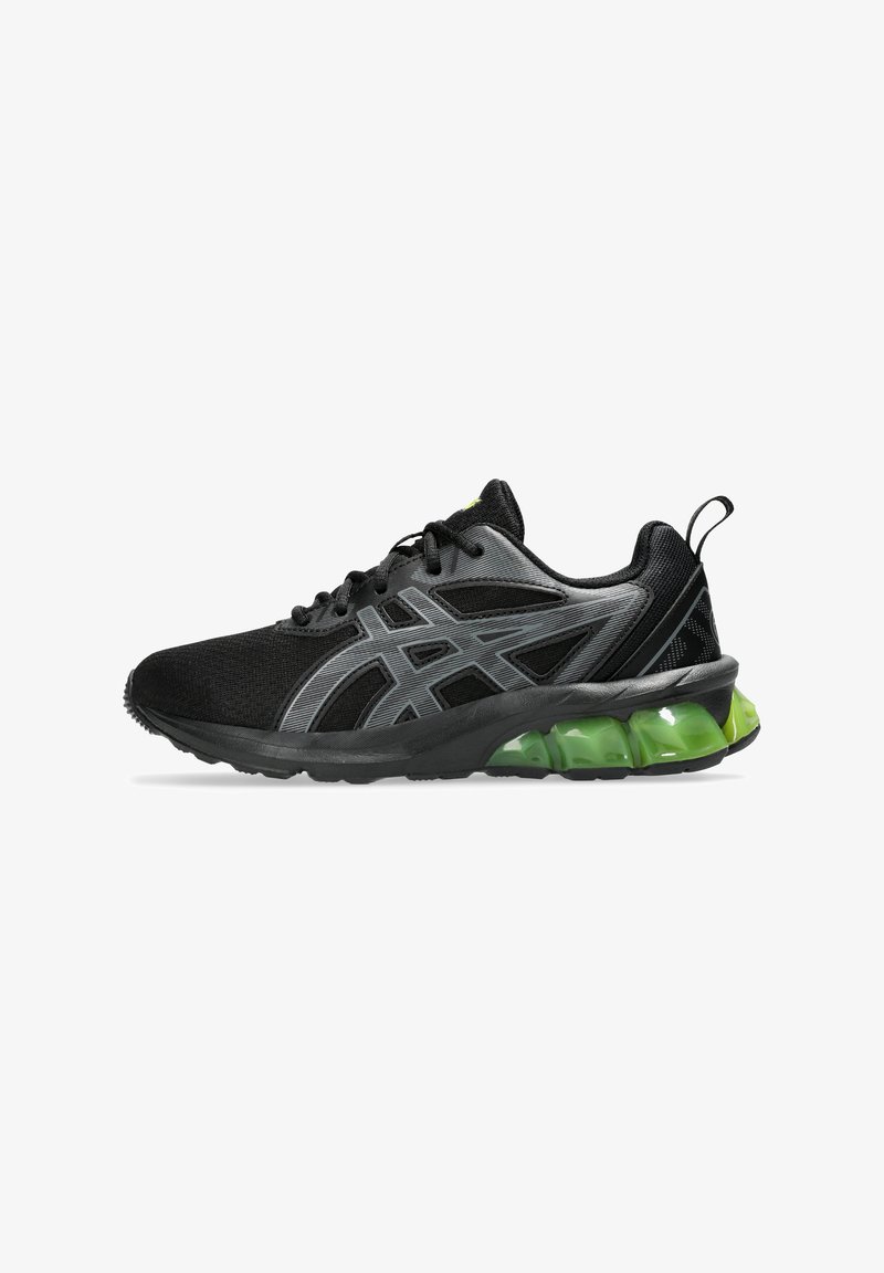Schwarze Sportschuhe mit Mesh-Obermaterial, grauen Akzenten und grüner Luftsohle. Sie haben eine abgerundete Form und ein Schnürsystem.