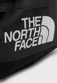 The North Face BASE CAMP DUFFEL S UNISEX - Cestovná taška - black/white