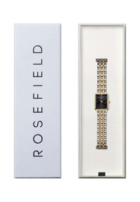 Orologio quadrato nero con dettagli dorati, dotato di un bracciale metallico con maglie dorate e silver, presentato in una scatola bianca con scritte nere.