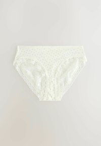 Witte katoenen ondergoed met groene stippen, afgewerkt met kant aan de randen en een soepele stoftextuur.