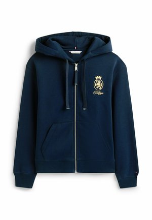 Felpa con zip navy in tessuto morbido, dotata di tasca frontale, cappuccio regolabile con cordino e ricamo del logo della corona dorata sul petto.