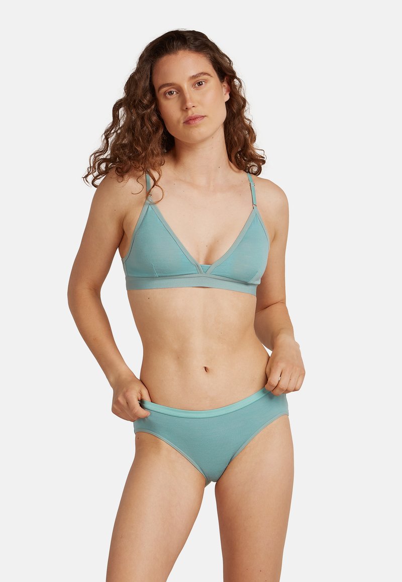 Set di reggiseno e slip in un delicato color teal, realizzato in materiale morbido, con un design del reggiseno triangolare dotato di spalline regolabili e uno stile hipster senza cuciture.