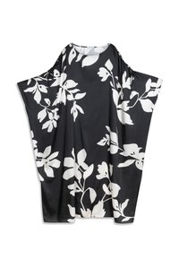 Kaftan en tissu noir avec de grands motifs floraux blancs, à la coupe ample et fluide, avec des détails de nouage aux épaules.