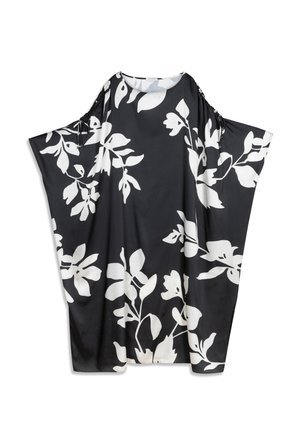 Čierny látkový kaftan s veľkými bielymi kvetinovými vzormi, vo voľnom, prúdiacom strihu s viazaním na ramenách.