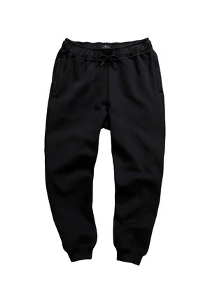 Pantalones de chándal negros, fabricados con un tejido suave, cuentan con una cintura elástica con cordón, bolsillos laterales y puños ajustados en los tobillos.