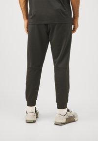 Nike Performance PANT - Tréningruha alsók - black