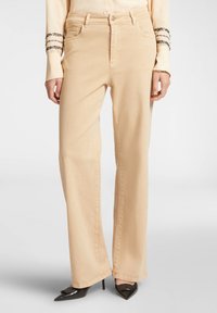 WIDE - Vaqueros a campana - beige