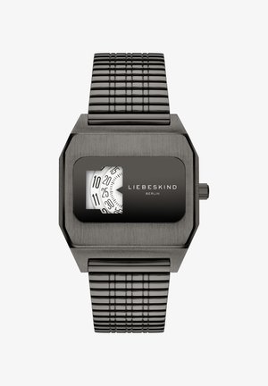 Orologio rettangolare nero con cinturino in metallo testurizzato. Presenta un quadrante grande e chiaro con un quadrante bianco circolare che mostra dei marker numerici per l'ora.