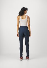 Kari Traa TIRILL HYBRID TIGHTS - Legingi - dark navy blue