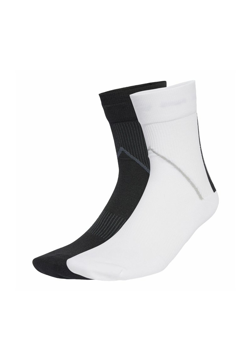 Black and white ankle socks made of a thin, textured material, featuring a contrasting grey pattern on the black sock and a smooth finish.