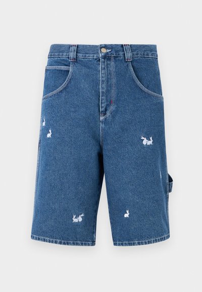 Denim shorts in medium blue featuring five pockets, white rabbit embroidery, and a relaxed fit. Distressed detailing on the fabric.