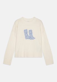 Kremfarget genser med et lys blått cowboystøvledesign i midten, rund halslinning og ribbestrikkede mansjetter og kant.