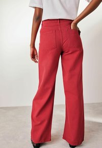 Next Trapezaste traperice - red