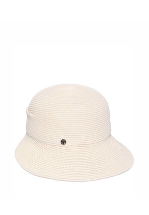 Cream-colored woven cloche hat with a small round metal logo on the side and a slightly flared brim.