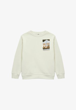 Jasnobeżowa bluza w miękkim materiale, z graficznym wzorem gór oraz napisem "W DRODZE" w pomarańczowym i czarnym kolorze. ściągacze przy mankietach i u dołu.