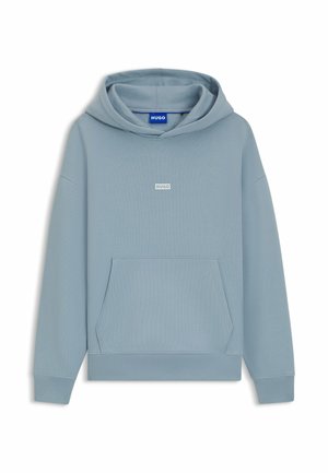 Hooded sweatshirt in light blue, made of textured fabric. Features a kangaroo pocket and a small white brand logo on the chest.