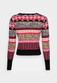 Pull en maille avec plusieurs motifs : rayures noires, roses et beiges avec des cœurs, un imprimé zèbre et un imprimé léopard. Design court, poignets côtelés.
