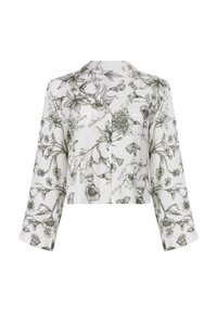 Witte cropped button-up shirt met zwart gedetailleerde bloemen- en vlinderprint, met lange mouwen en een notch kraag.