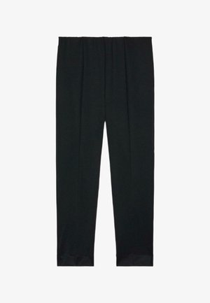 Pantalon noir en tissu à la texture lisse, taille élastique et coupe effilée. Détails pliés au niveau de l'ourlet.