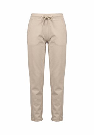 Beige Freizeithose mit elastischem Bund, Fronttaschen, Kordelzug, schmal zulaufenden Beinen und hochgekrempelten Bündchen.