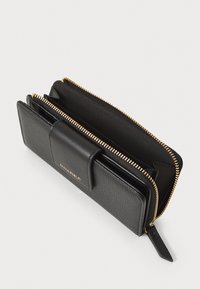 Black leather wallet featuring a textured exterior, gold zipper, and a snap closure. Interior compartments for cards and cash.