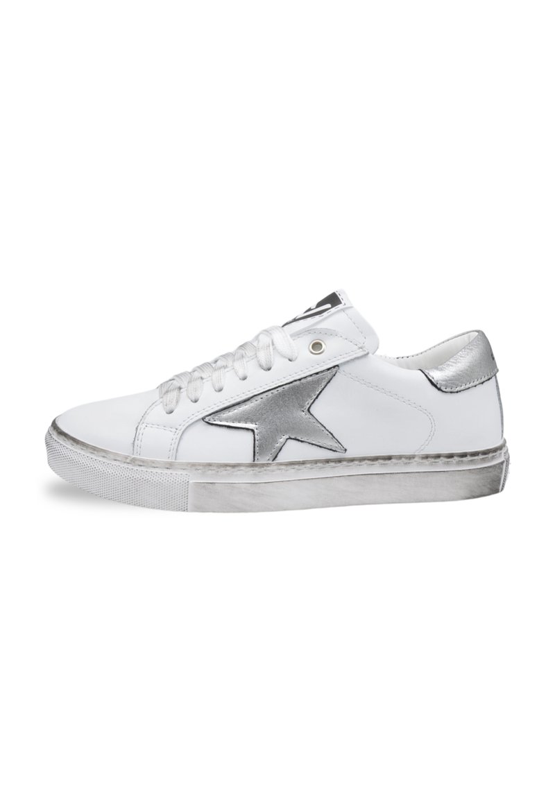 White leather sneaker with silver star accent, round toe, textured white sole, and white laces. Features metallic detailing on tongue and heel.