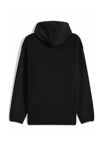 Schwarzer Kapuzenpullover mit Fleece-Rückseite und glatten Stoffärmeln. Auffällige Textur auf der Rückseite, lockere Passform und keine sichtbaren Logos.