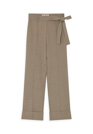 Tan wide-leg trousers made of textured fabric, featuring a belted waist and turned-up cuffs. Part of the MINIMUM collection.