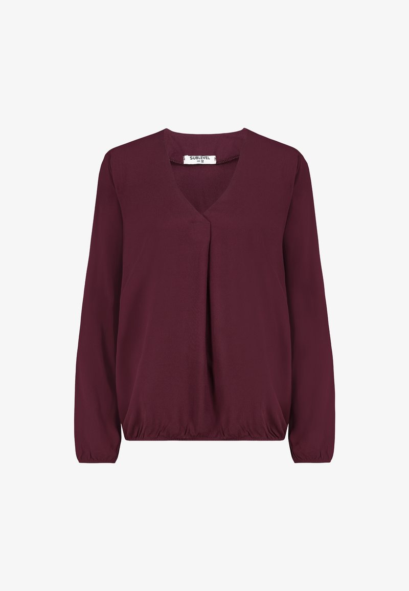 Long-sleeve, deep burgundy blouse with V-neck, slight front pleat, elastic hem and cuff, labeled "Sublevel" size M.