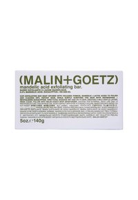 Weißer rechteckiger Karton mit grüner Schrift, der ein Mandel-säure-Peeling-Bar enthält; umfasst mehrsprachige Produktbeschreibung und Gewicht.