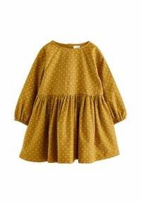 Abito giallo senape con pois bianchi, maniche lunghe, scollatura rotonda e gonna arricciata. Tessuto morbido, design casual.