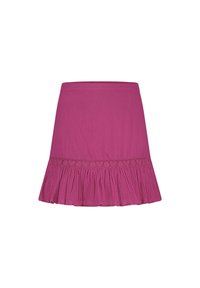 Rosa uitlopende rok gemaakt van lichtgewicht stof, met een gerimpelde zoom en een decoratieve geborduurde tailleband met hartpatronen.