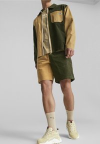 Puma Lehká bunda - green
